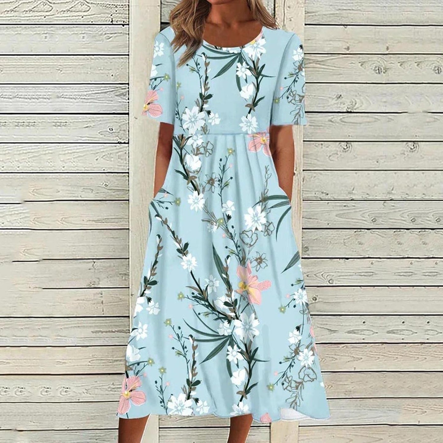 Sommarklänning med blommigt tryck, flertal mönster/färger längre lev.tid
