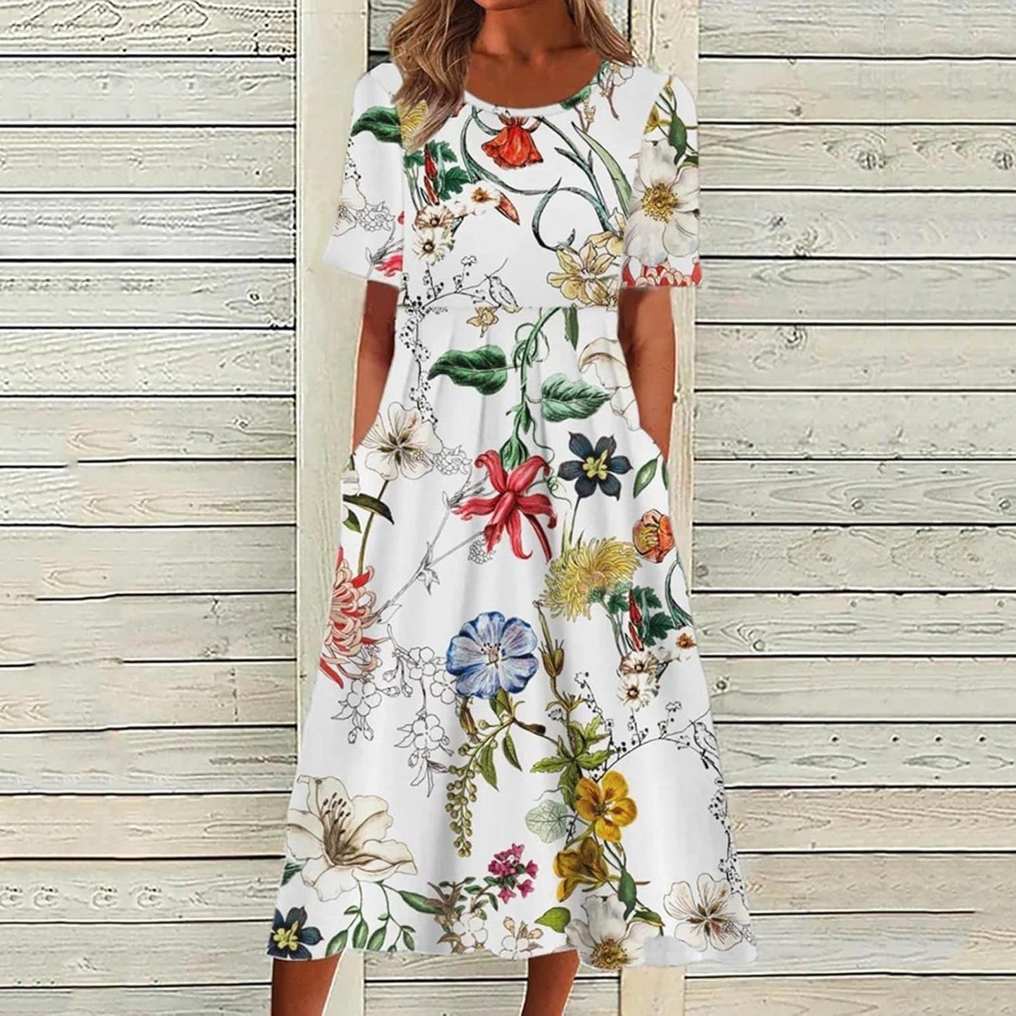 Sommarklänning med blommigt tryck, flertal mönster/färger längre lev.tid